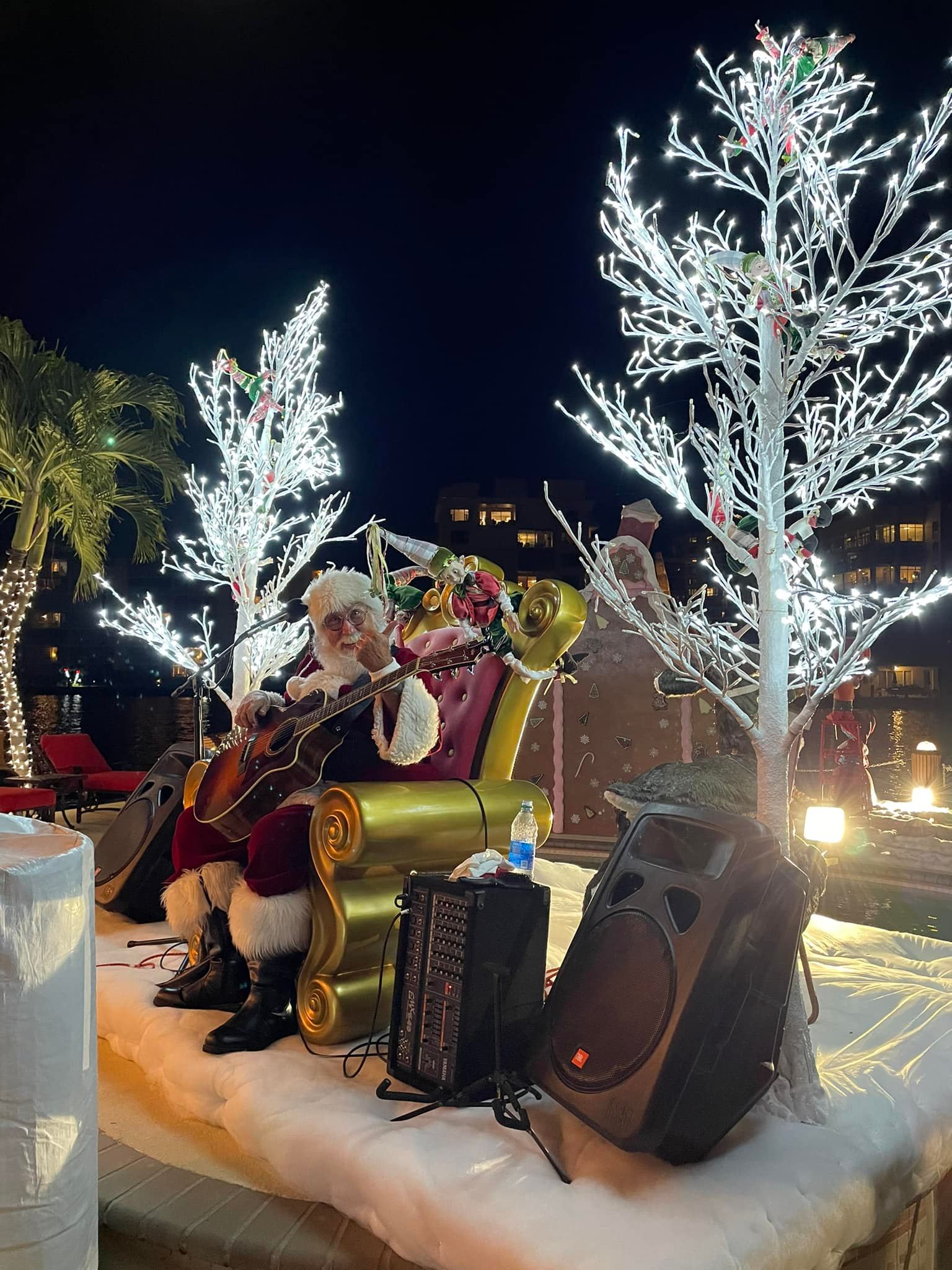 santa playing guitar