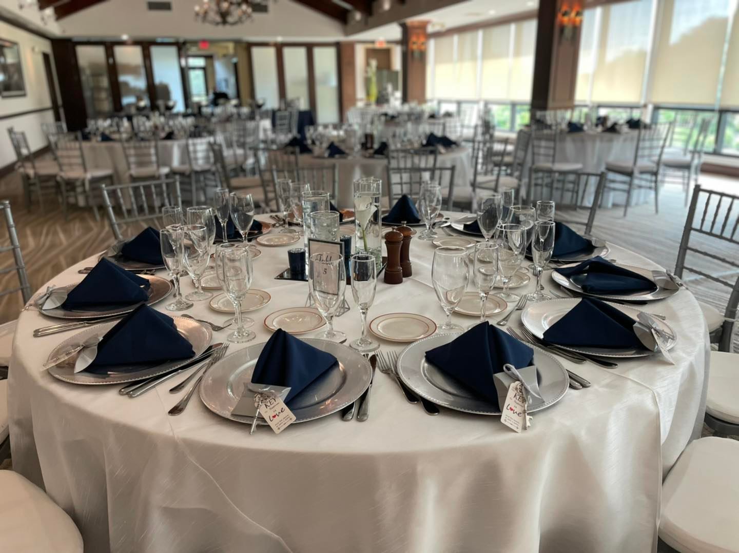 silver and navy wedding reception tables