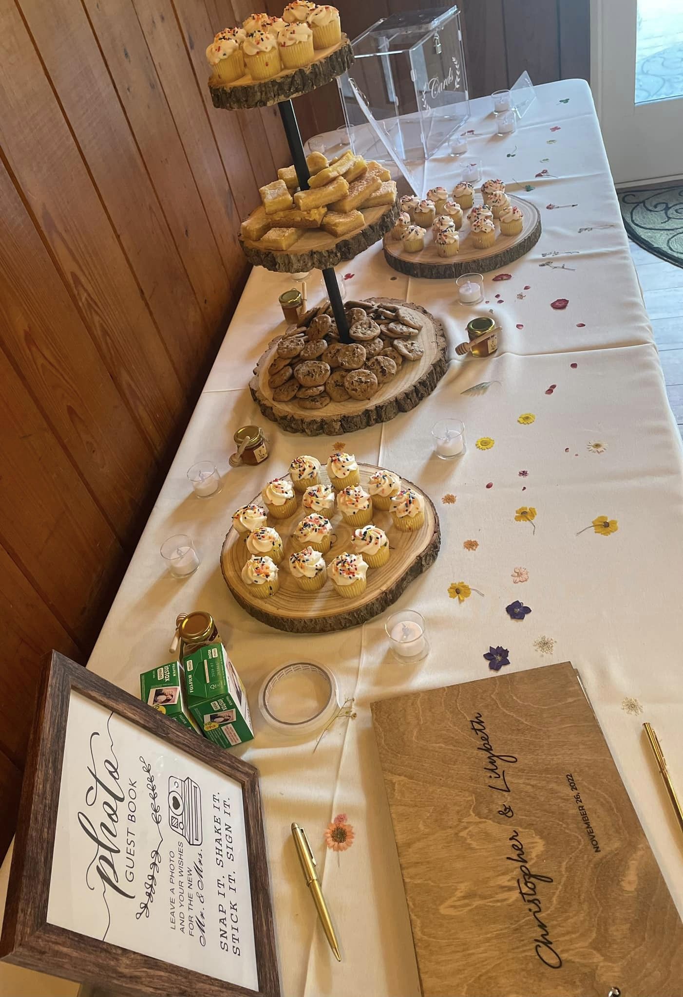 cupcakes and desserts on wooden serving dishes