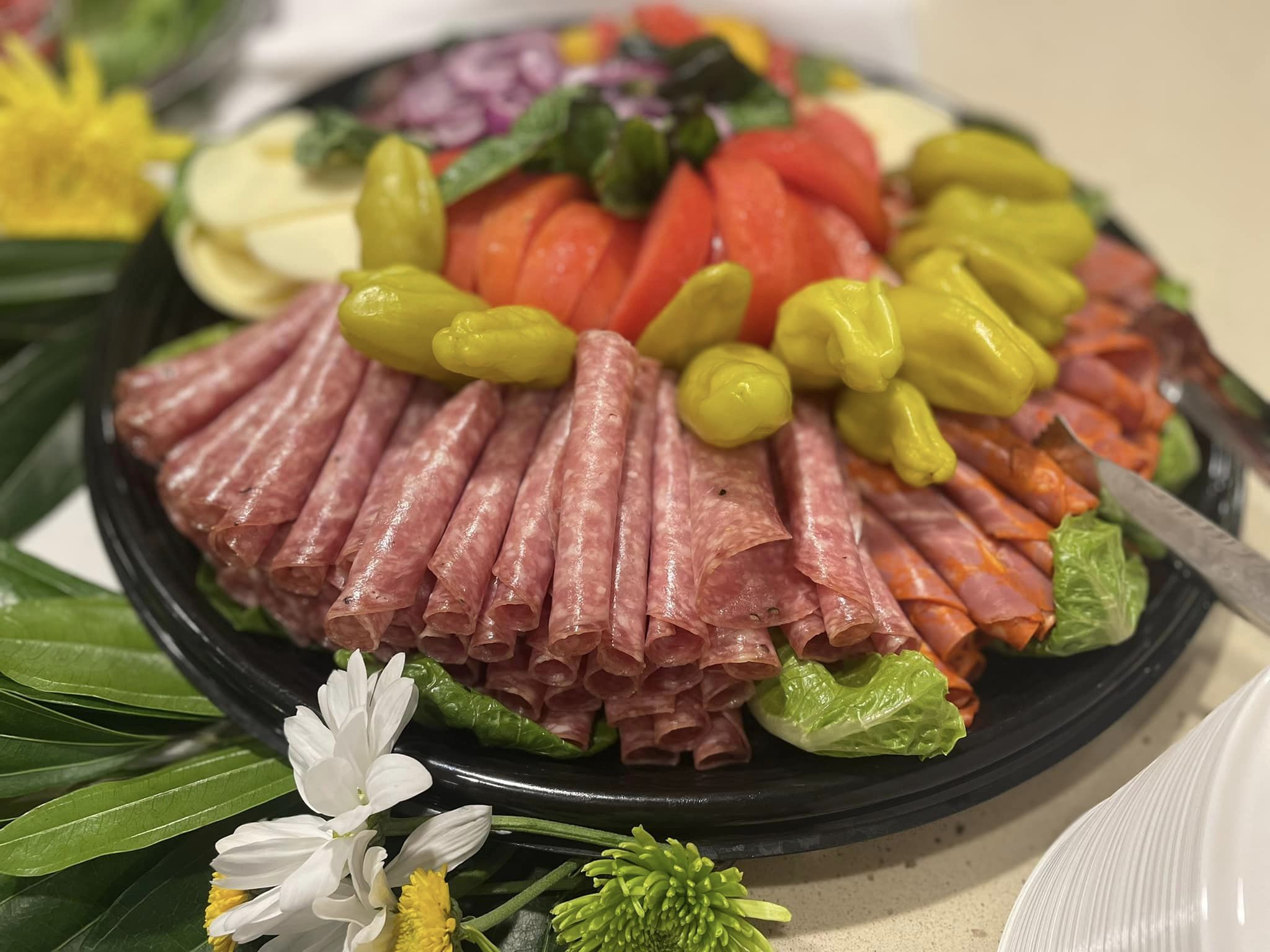 meat tray with pepperoncini peppers
