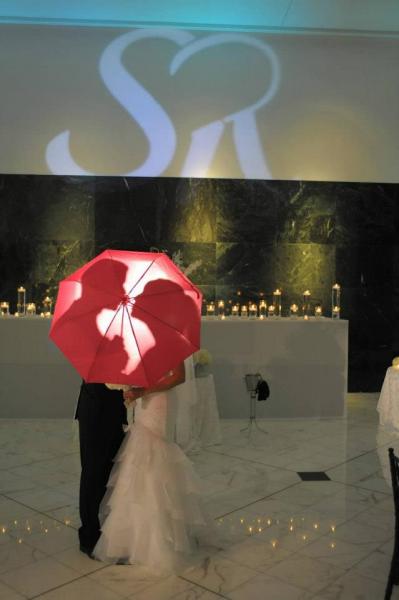 couple kissing under umbrella