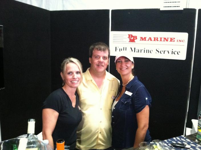 smiling vendor at trade show