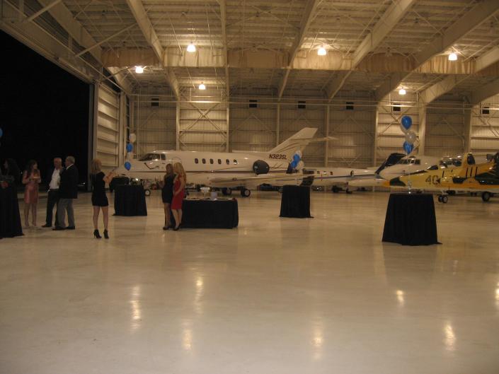 corporate event in airplane hangar