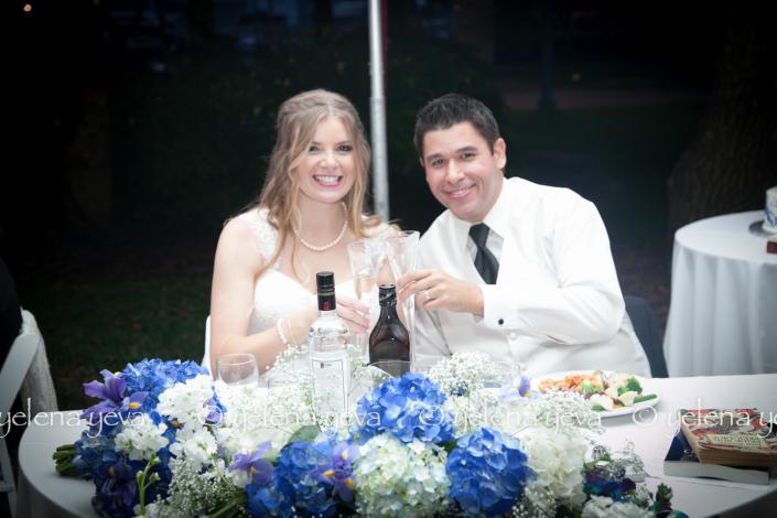 bride and groom making toast