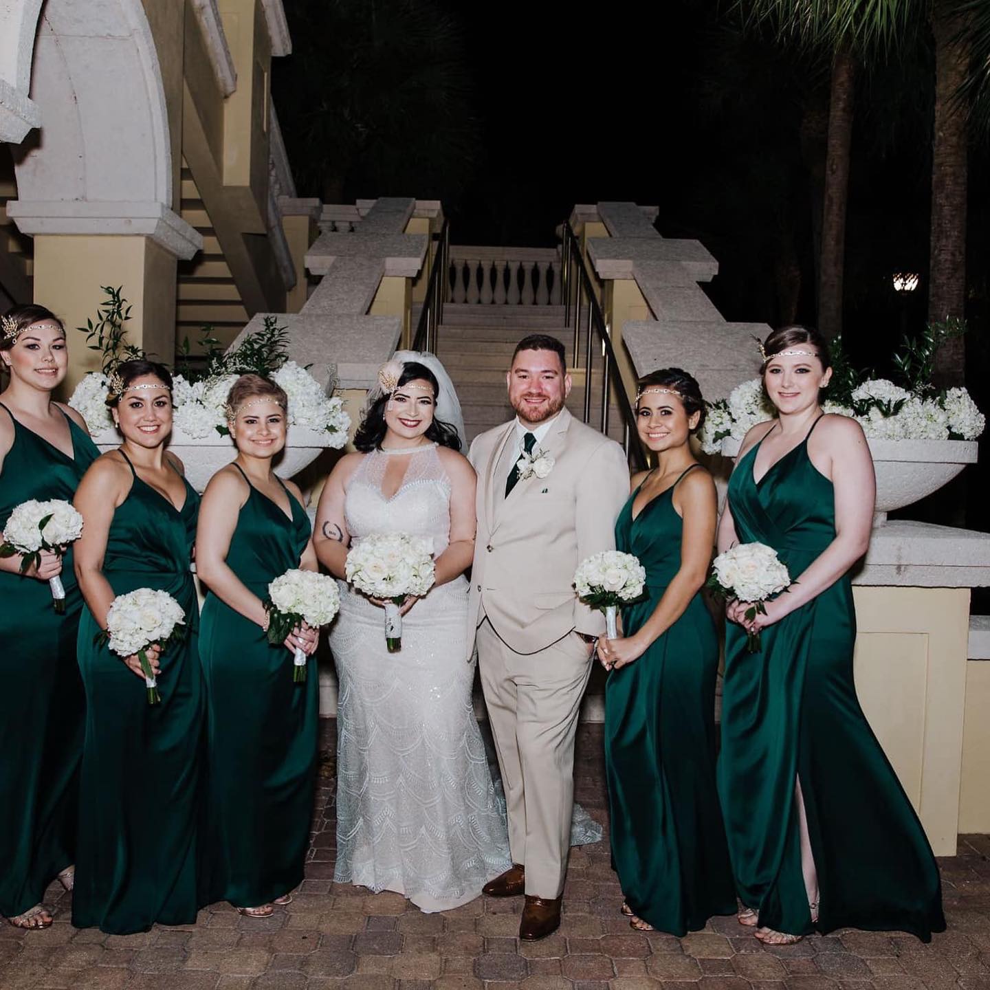 bride and groom with bridesmaids