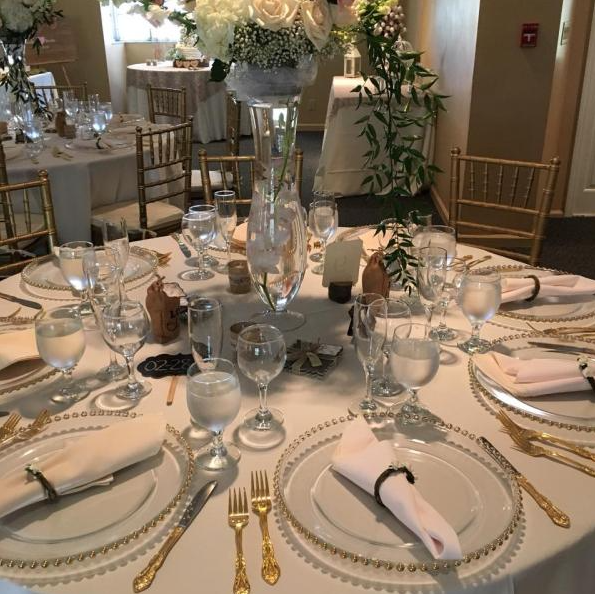 white and gold wedding reception table decor