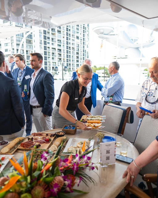 waiter serving guests at corporate event