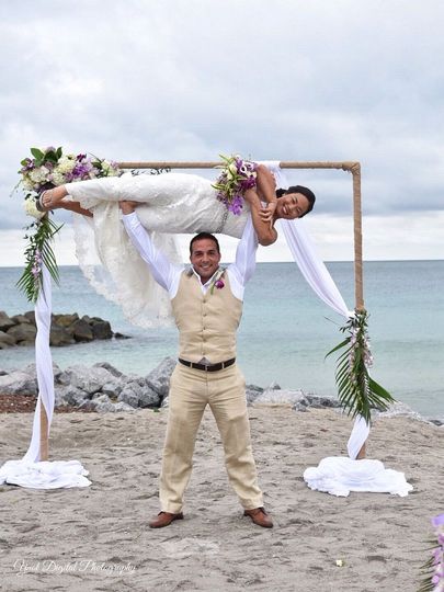 groom lifting bride