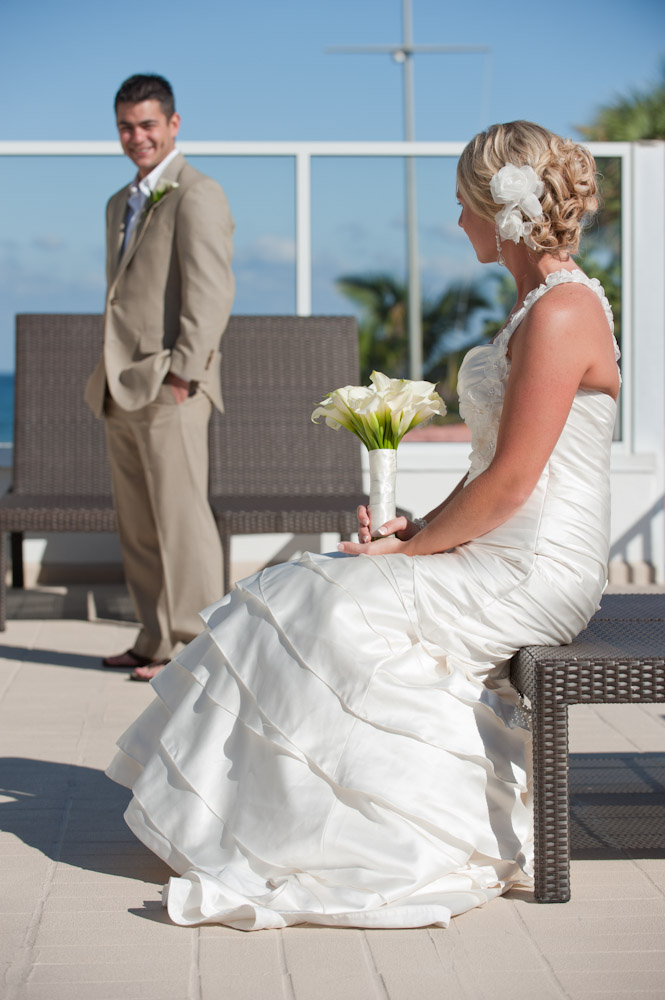 groom and bride looking at each other